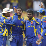 Muttiah Muralitharan celebrates a wicket