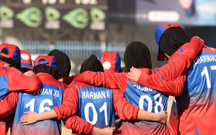 Afghanistan women huddle