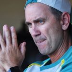 Justin Langer hands together