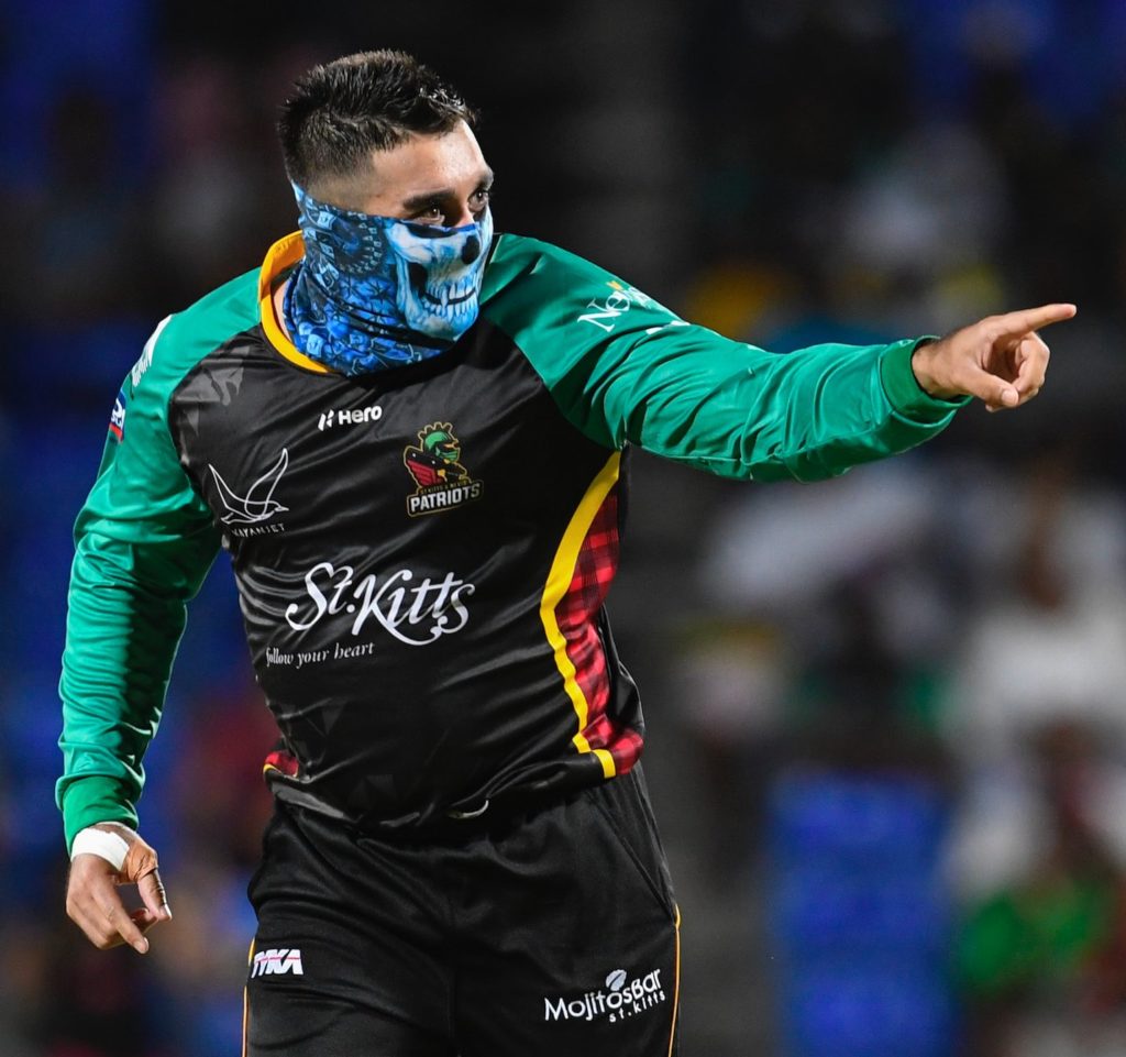 Tabraiz Shamsi mask celebration