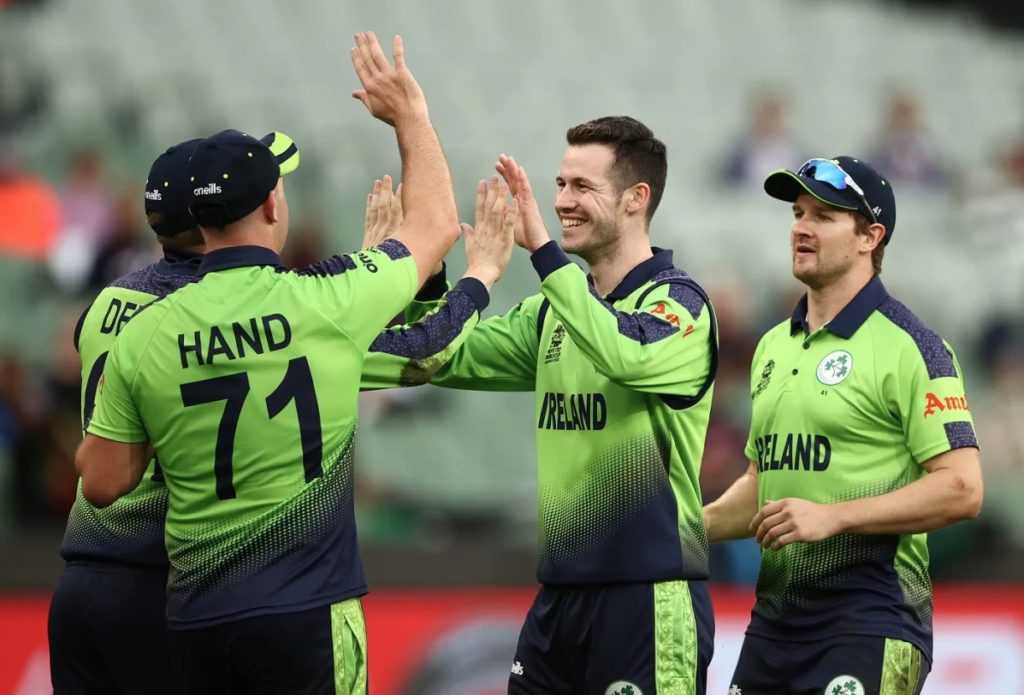 George Dockrell celebrates with Ireland teammates