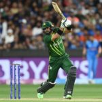 Pakistan's Iftikhar Ahmed lifts off against India