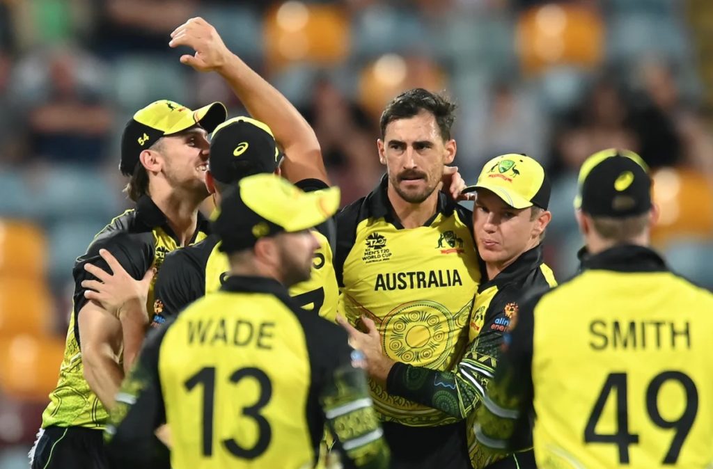 Mitchell Starc celebrates with his Australia teammates