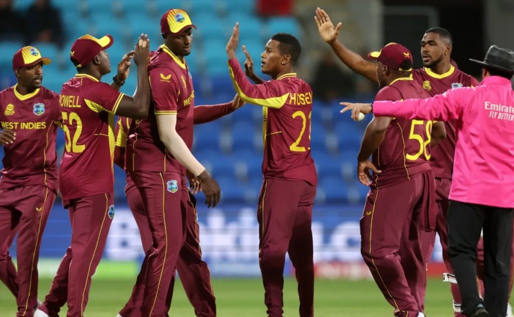 West Indies celebrate taking a wicket against Zimbabwe at the T20 World Cup October 2022