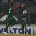 Ebadot Hossain wheels away in celebration after dismissing Axar Patel