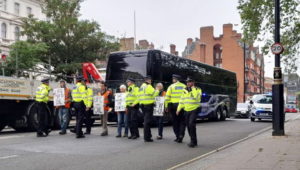 Protestors England bus