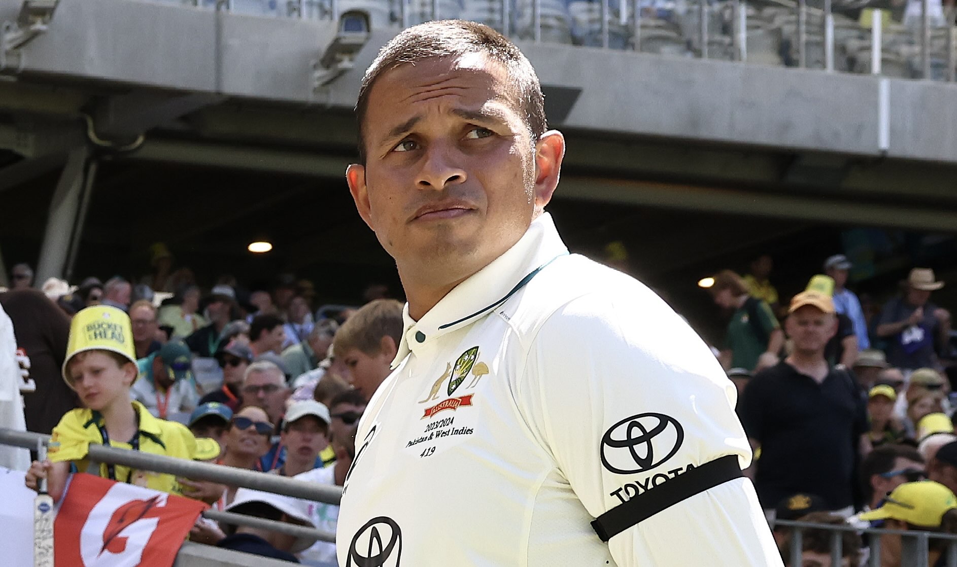 Khawaja wears black armband in Gaza protest