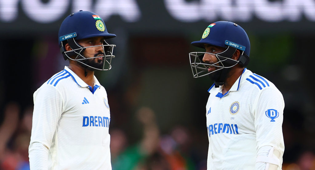 BRISBANE, AUSTRALIA - DECEMBER 17: Akash Deep and Jasprit Bumrah of India chat between wickets during day four of the Third Test match in the series between Australia and India at The Gabba on December 17, 2024 in Brisbane, Australia. (Photo by Chris Hyde/Getty Images)