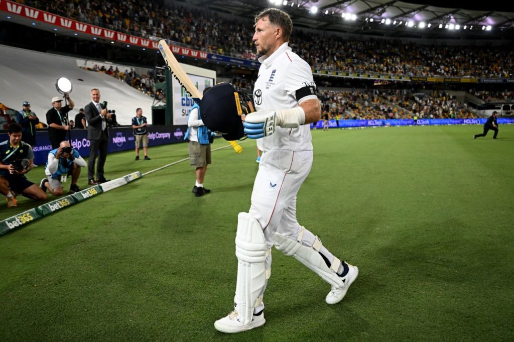 BRISBANE, AUSTRALIA - DECEMBER 04: Joe Root of England salutes the crowd at stumps on day one of the Second 2025/26 Ashes Series Test Match between Australia and England at The Gabba on December 04, 2025 in Brisbane, Australia. (Photo by Gareth Copley/Getty Images)