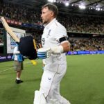 BRISBANE, AUSTRALIA - DECEMBER 04: Joe Root of England salutes the crowd at stumps on day one of the Second 2025/26 Ashes Series Test Match between Australia and England at The Gabba on December 04, 2025 in Brisbane, Australia. (Photo by Gareth Copley/Getty Images)