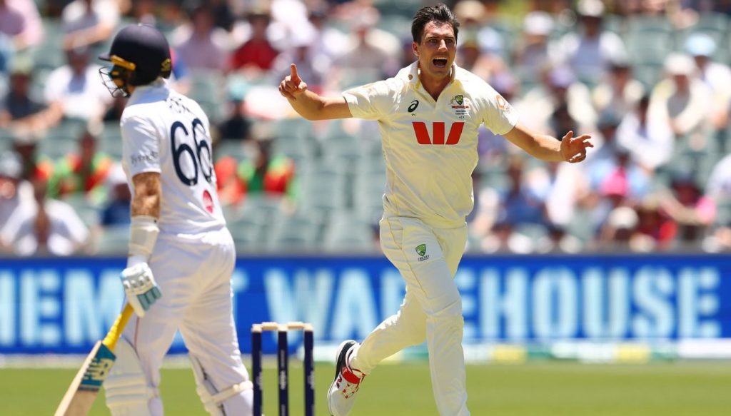 ADELAIDE, AUSTRALIA - DECEMBER 18: Pat Cummins of Australia celebrates taking the wicket of Joe Root of England for 19 runs during day two of the Third Test Match in the 2025-26 Ashes Series between Australia and England at Adelaide Oval on December 18, 2025 in Adelaide, Australia. (Photo by Robert Cianflone/Getty Images)