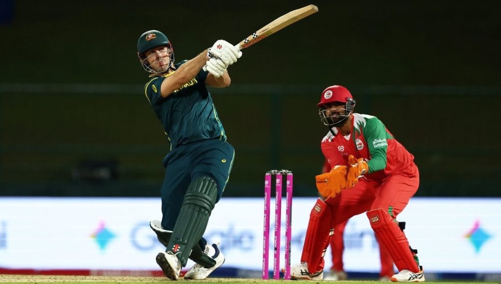 KANDY, SRI LANKA - FEBRUARY 20: Mitchell Marsh of Australia plays a shot as Vinayak Shukla of Oman keeps during the ICC Men's T20 World Cup India & Sri Lanka 2026 match between Australia and Oman at Pallekele Cricket Stadium on February 20, 2026 in Kandy, Sri Lanka. (Photo by Robert Cianflone/Getty Images)