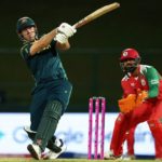 KANDY, SRI LANKA - FEBRUARY 20: Mitchell Marsh of Australia plays a shot as Vinayak Shukla of Oman keeps during the ICC Men's T20 World Cup India & Sri Lanka 2026 match between Australia and Oman at Pallekele Cricket Stadium on February 20, 2026 in Kandy, Sri Lanka. (Photo by Robert Cianflone/Getty Images)
